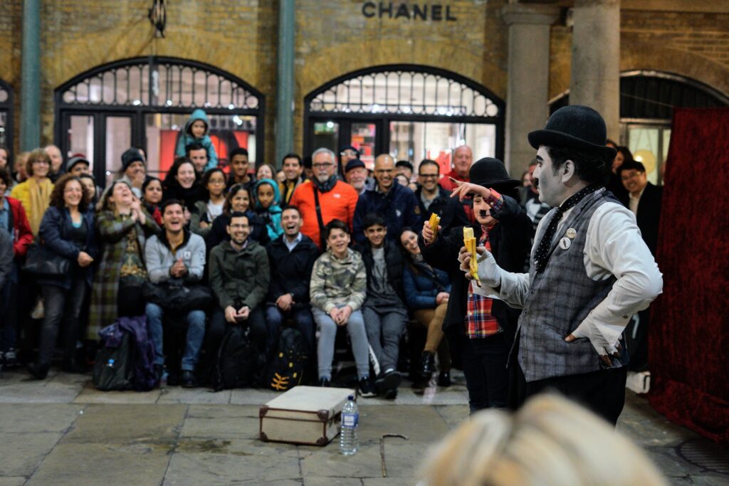 BAM! Be A Man. People Laughing. Street Performer.